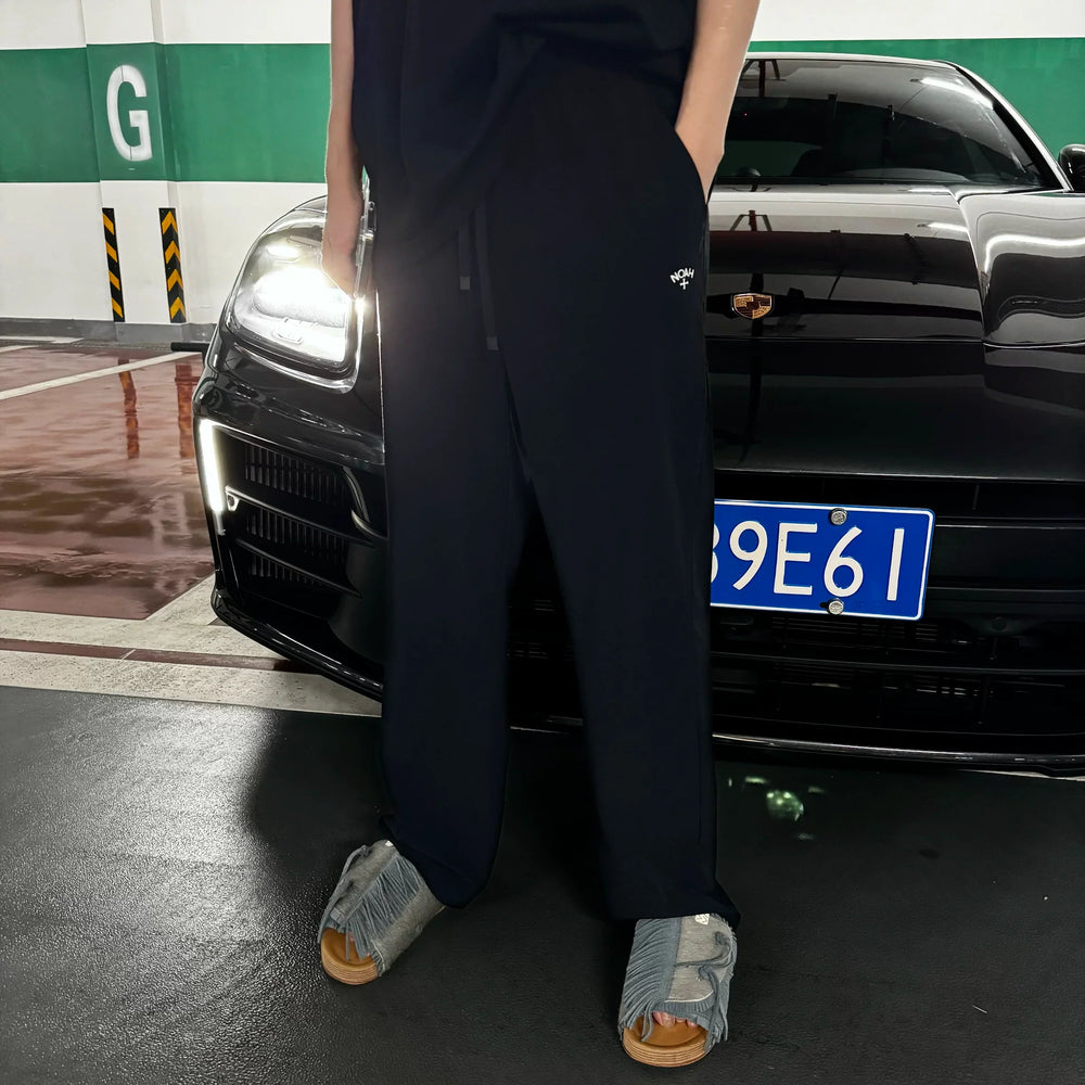 NOAH MARS small logo embroidered cross outdoor windproof American casual woven paper feeling lightweight curved knife pants