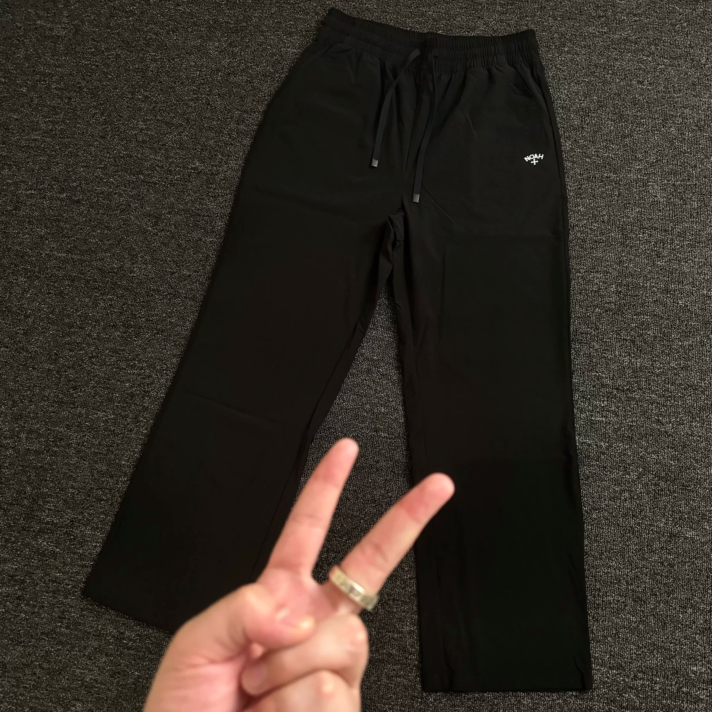 NOAH MARS small logo embroidered cross outdoor windproof American casual woven paper feeling lightweight curved knife pants