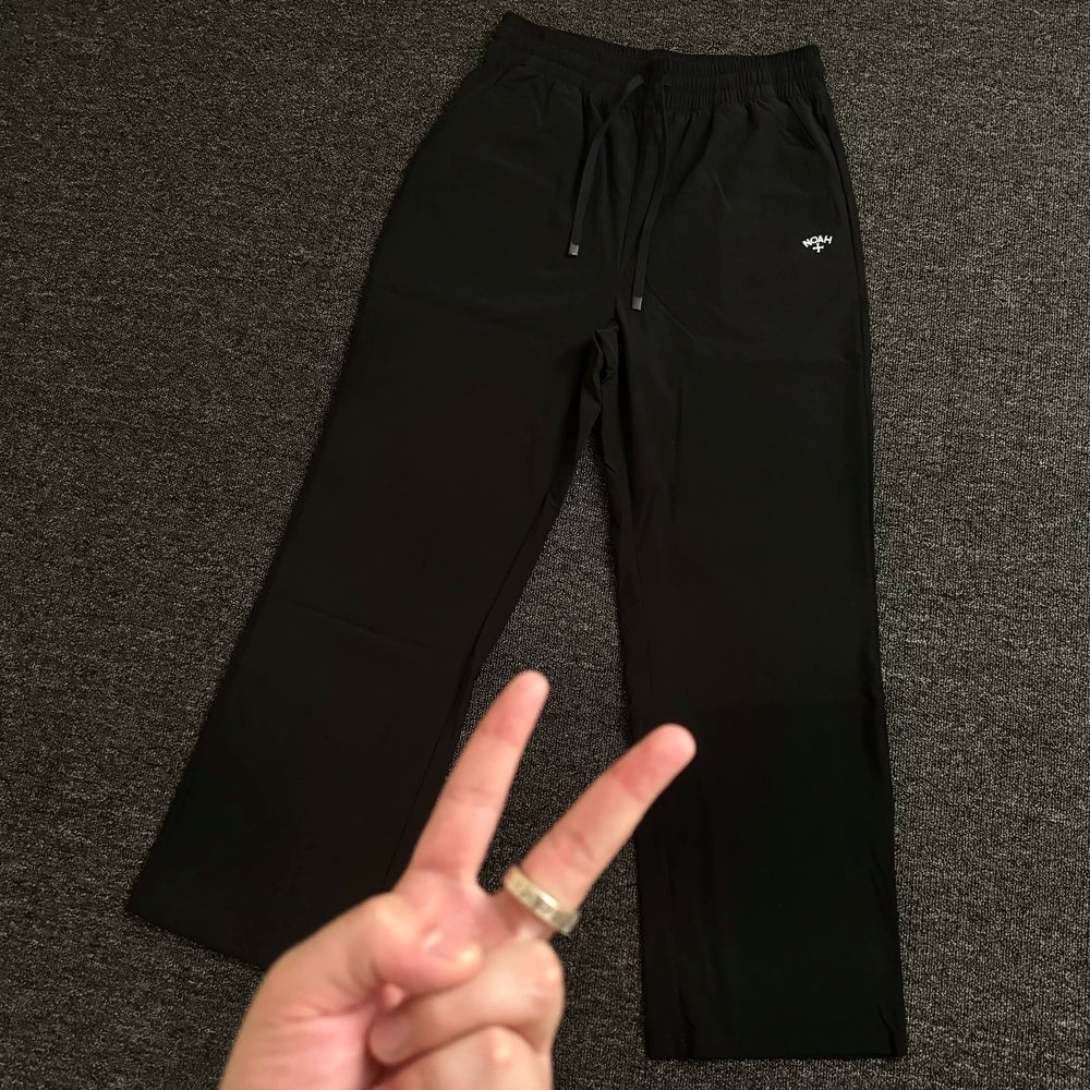 NOAH MARS small logo embroidered cross outdoor windproof American casual woven paper feeling lightweight curved knife pants
